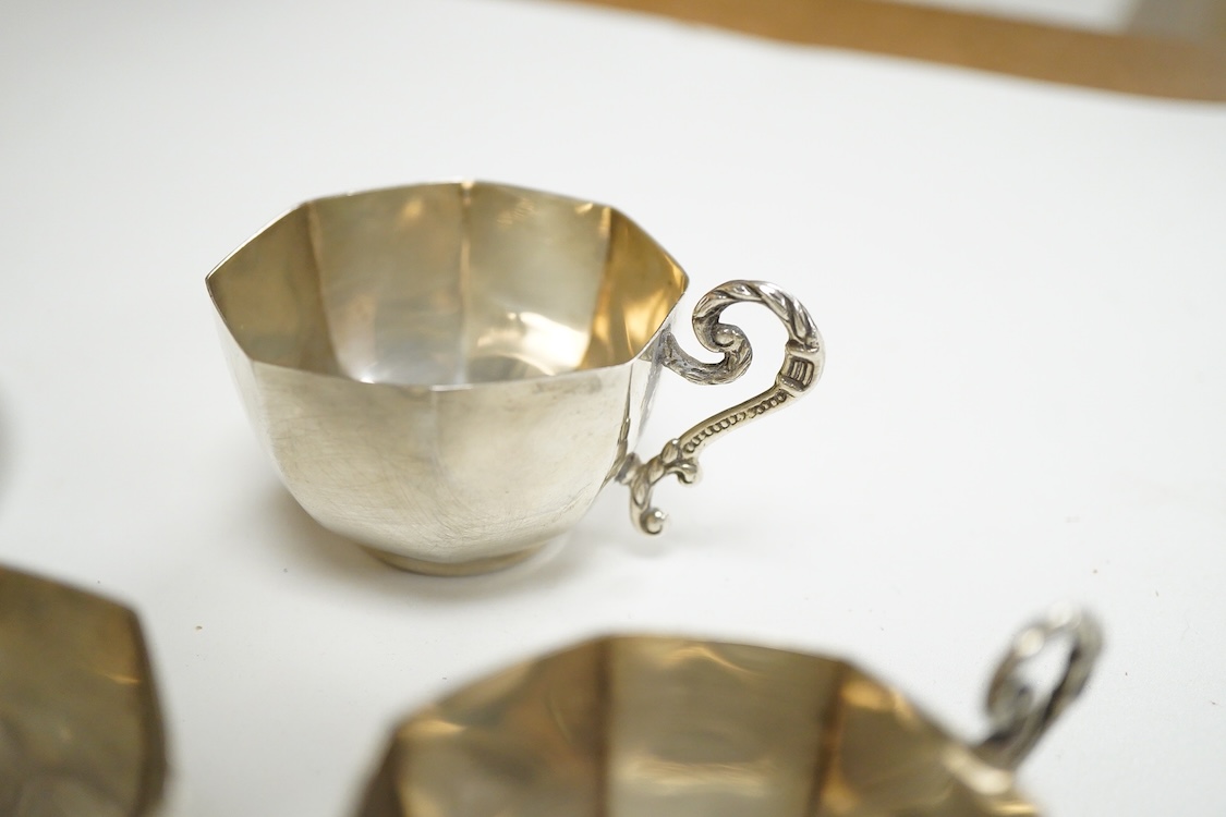 Four 20th century Turkish Sener 925 octagonal coffee cups and two saucers, together with four other Turkish 800 standard white metal small dishes and one other 800 dish, 13oz.